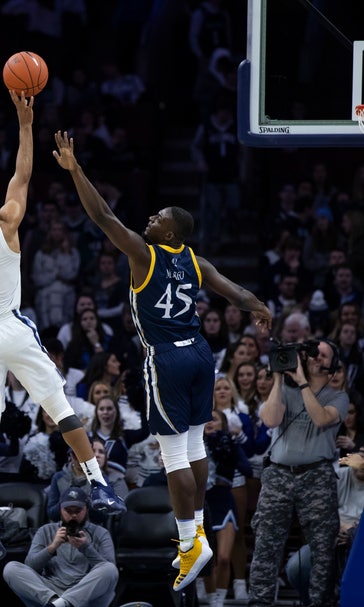 Booth helps No. 9 Villanova beat Quinnipiac 86-53